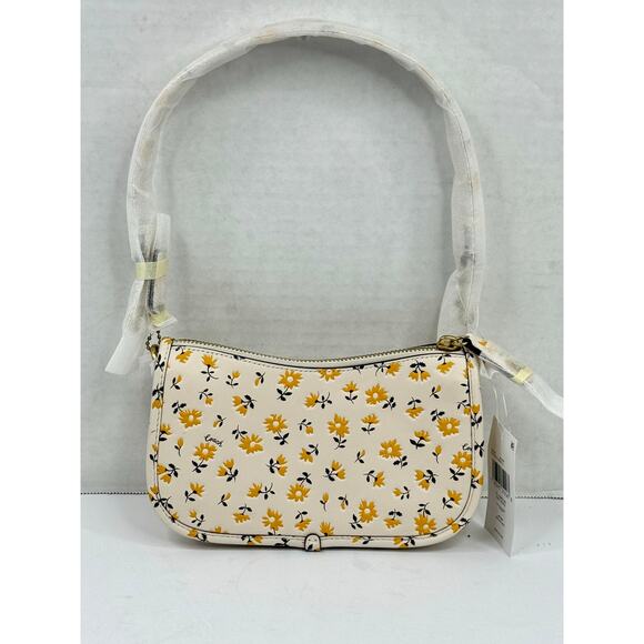 COACH Swinger 20 Floral Print Leather Bag Color is Chalk Multi NWT - Picture 1 of 11
